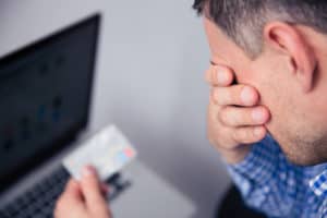 hiding his financial bills