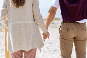 hold her hands