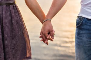 when to hold her hand